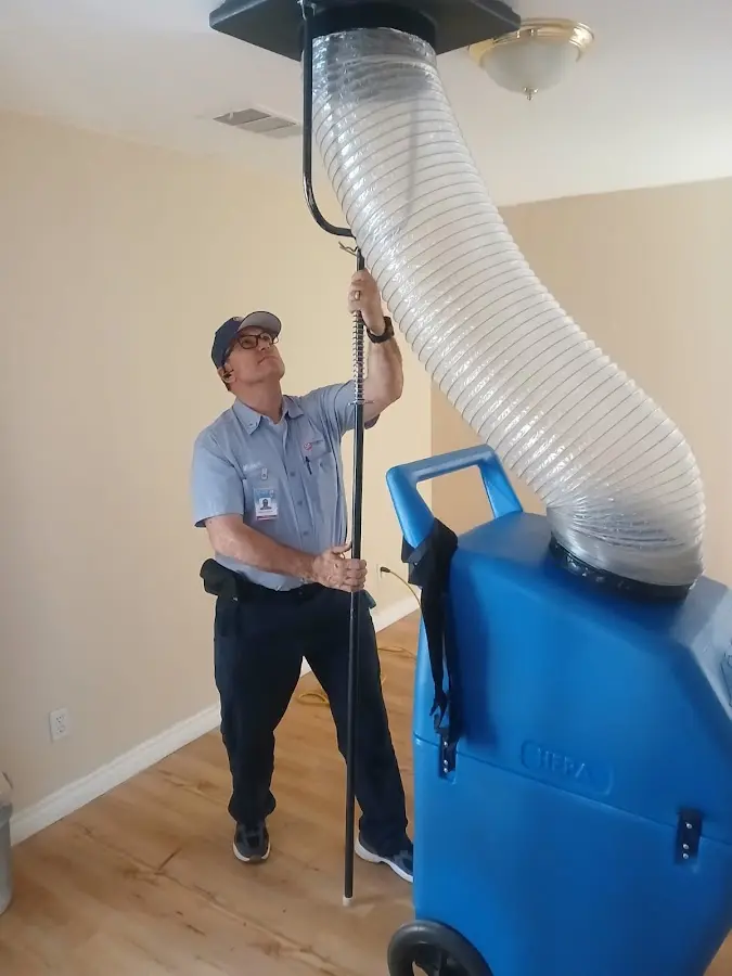 HVAC Installation technician using HEPA equipment in Clark